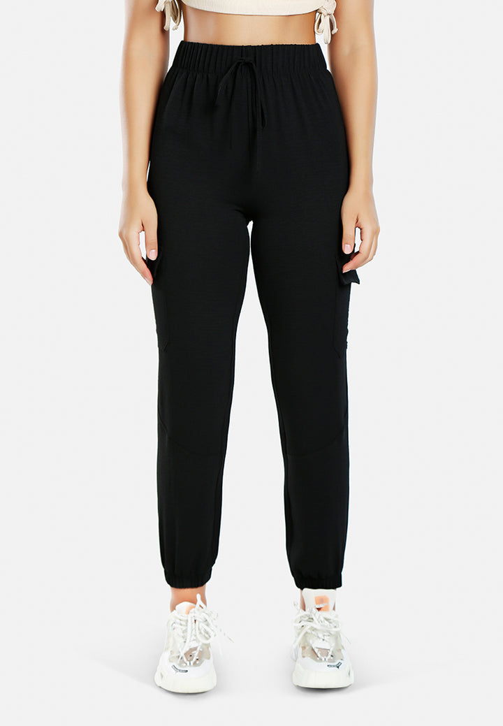 women high-rise cargo drawstring pants#color_black