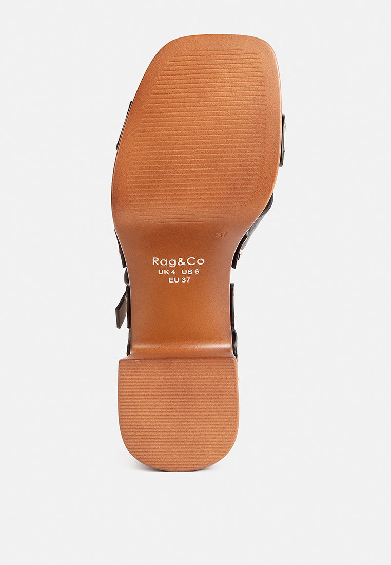 women cross strap stud embellished heels#color_black