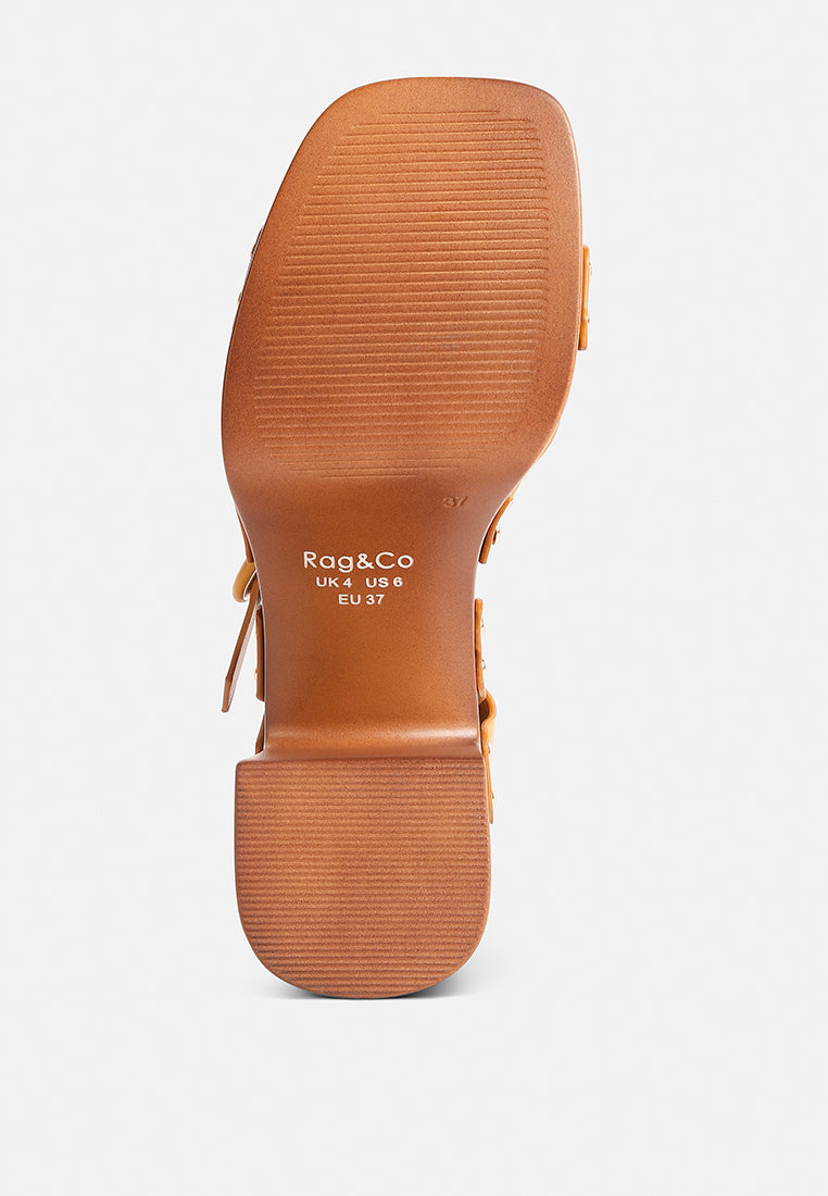 women cross strap stud embellished heels#color_tan