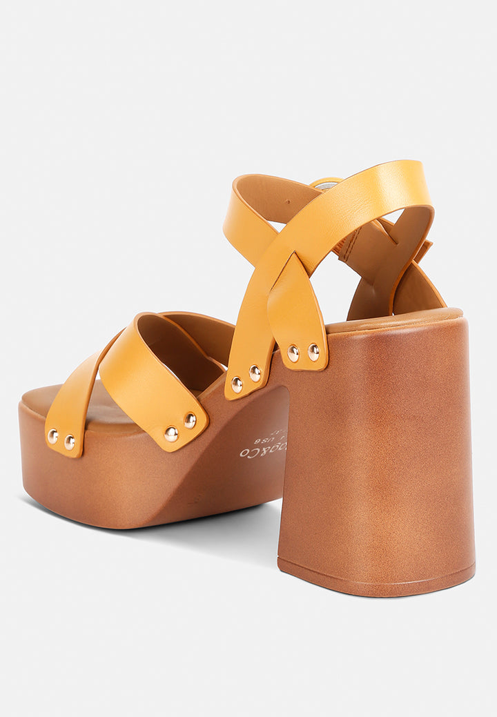 women cross strap stud embellished heels#color_tan