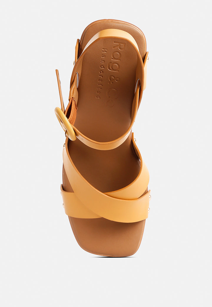 women cross strap stud embellished heels#color_tan