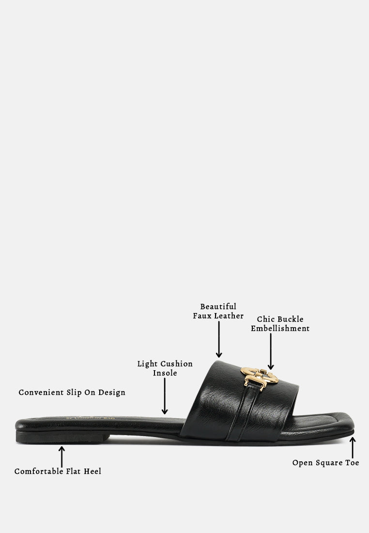 women metallic buckle embellished slip ons#color_black