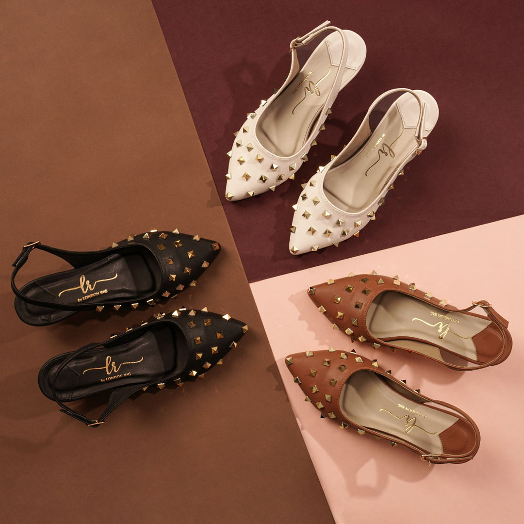 women gold accent studded sandals#color_black