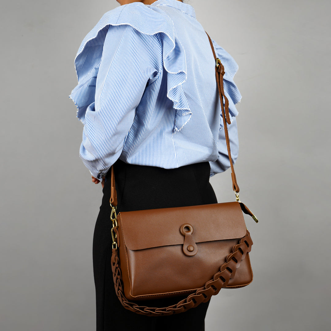 the unconventional sling bag#color_brown