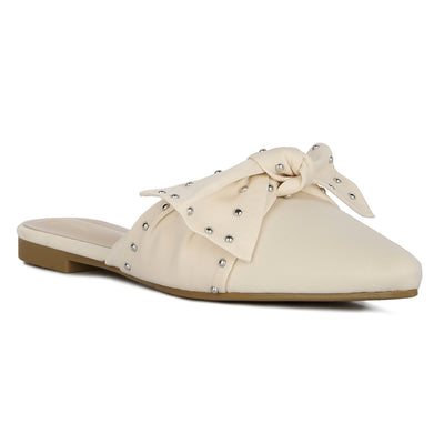 studded bow flat mules#color_beige
