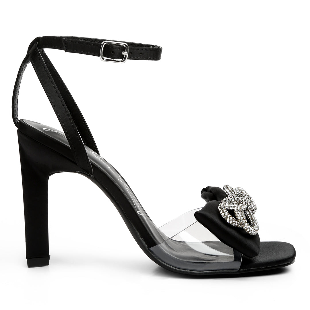 etherium diamante embellished bow with stiletto heeled sandals#color_black