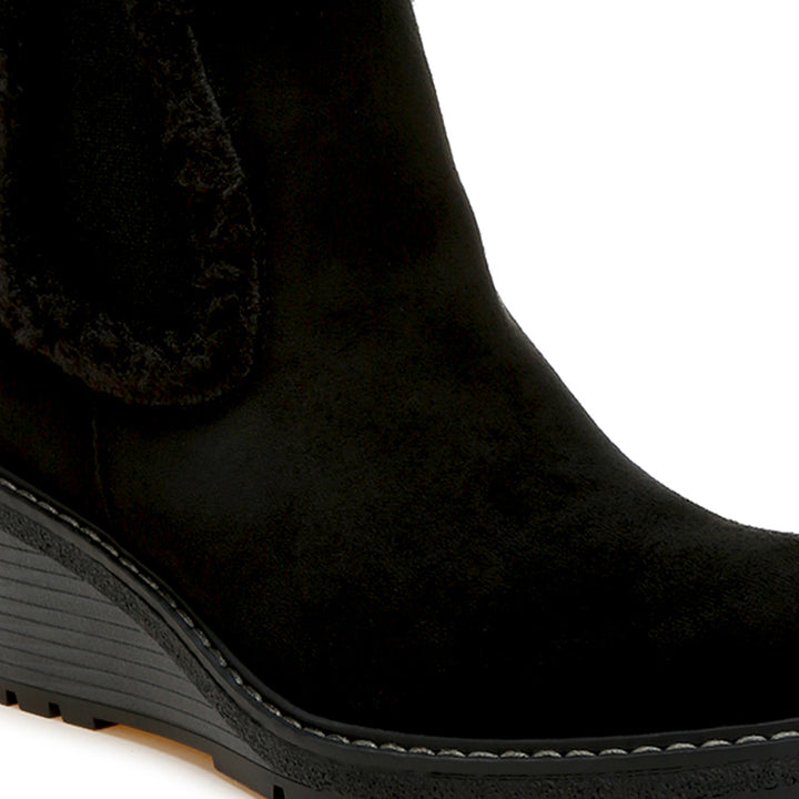 faux fur lined chelsea boots#color_black