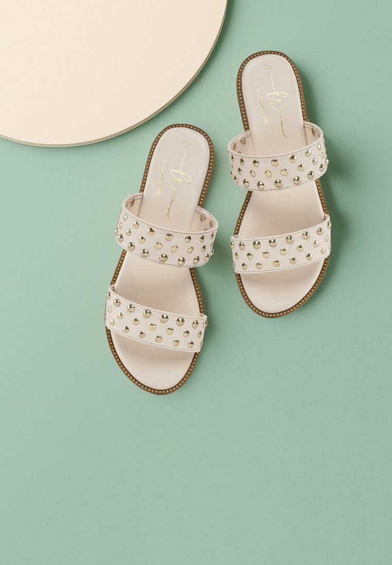 women studded faux leather slip ons#color_beige