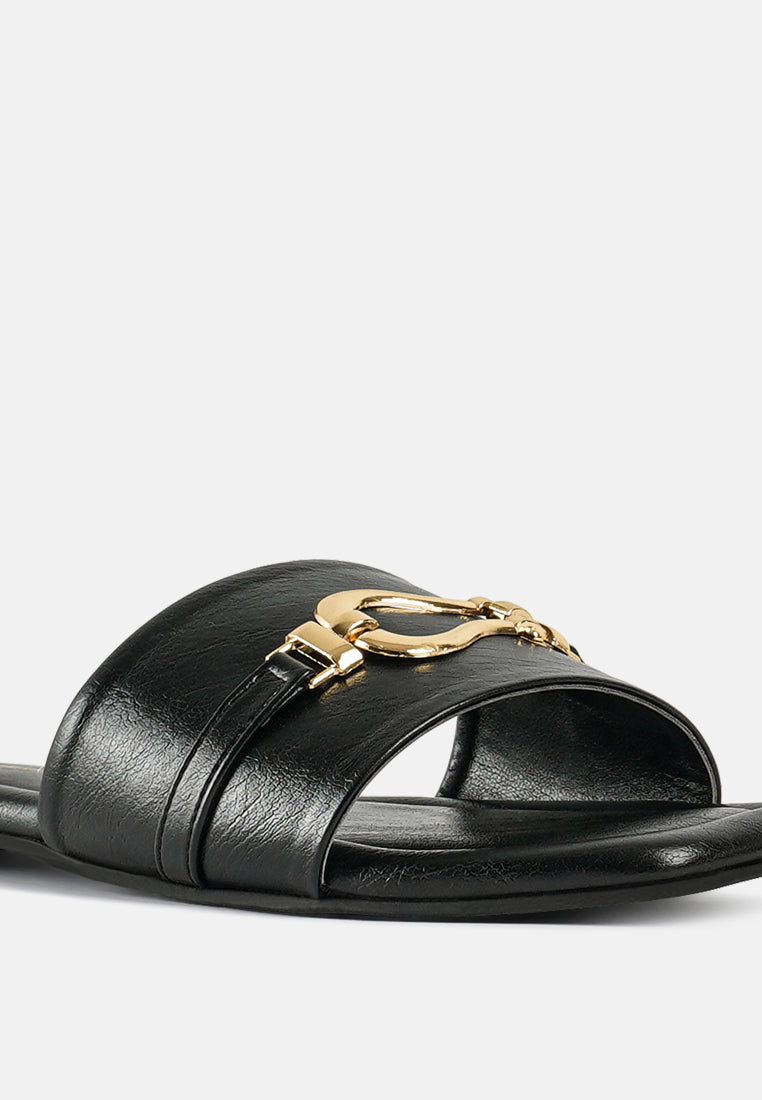 women metallic buckle embellished slip ons#color_black