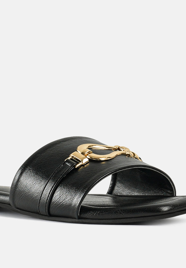 women metallic buckle embellished slip ons#color_black