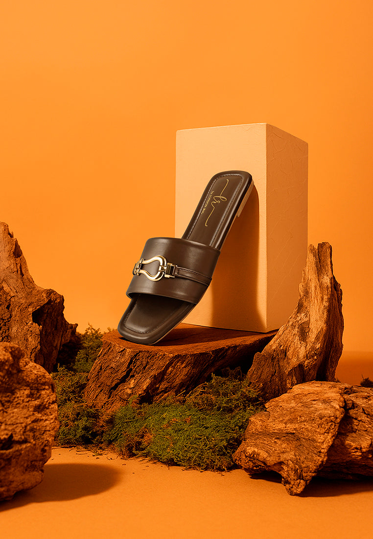 women metallic buckle embellished slip ons#color_brown