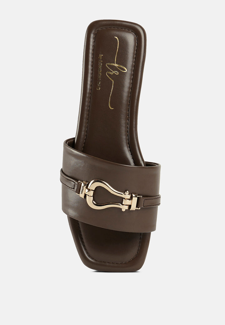 women metallic buckle embellished slip ons#color_brown