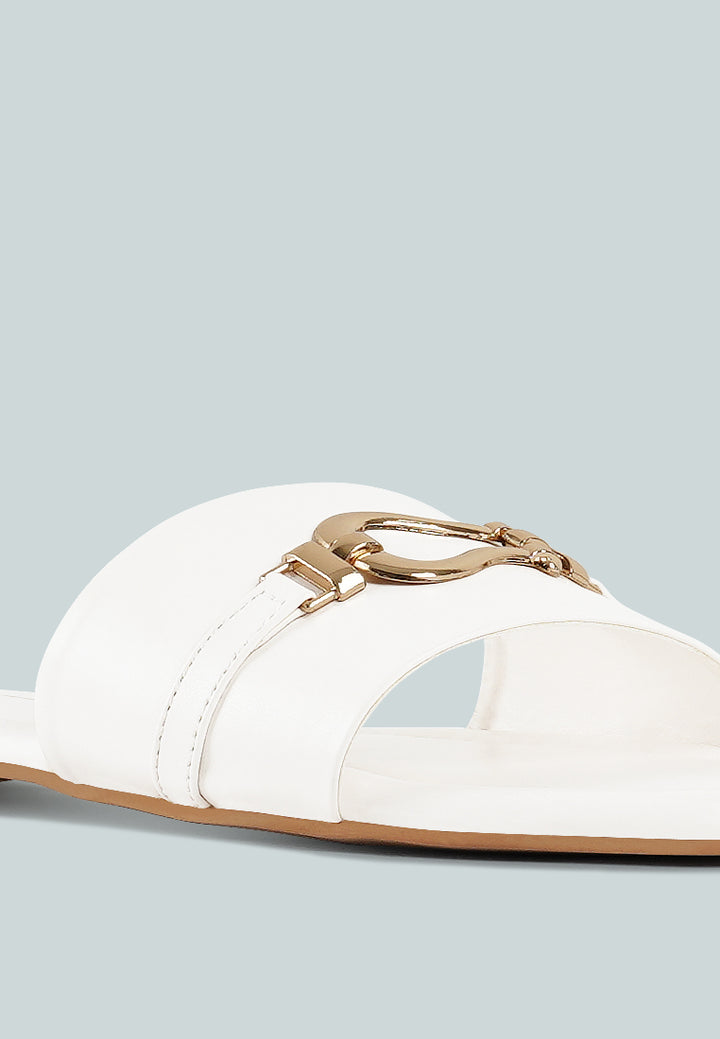 women metallic buckle embellished slip ons#color_off-white