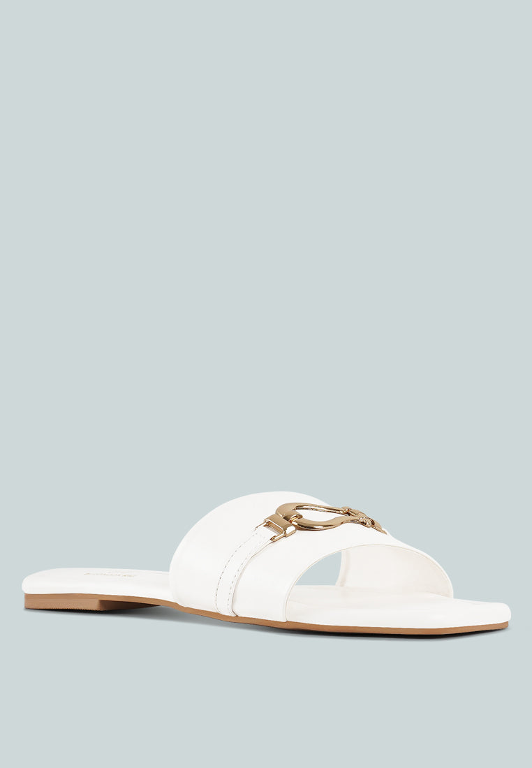 women metallic buckle embellished slip ons#color_off-white