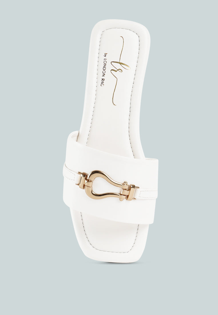 women metallic buckle embellished slip ons#color_off-white