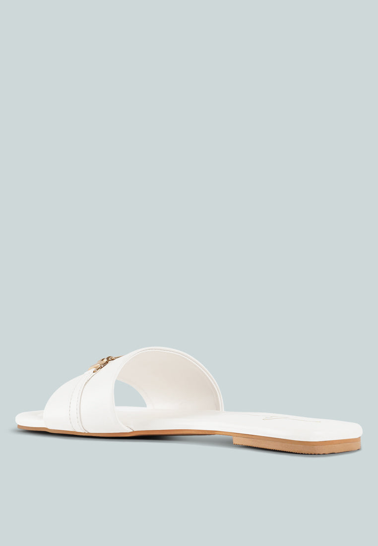 women metallic buckle embellished slip ons#color_off-white