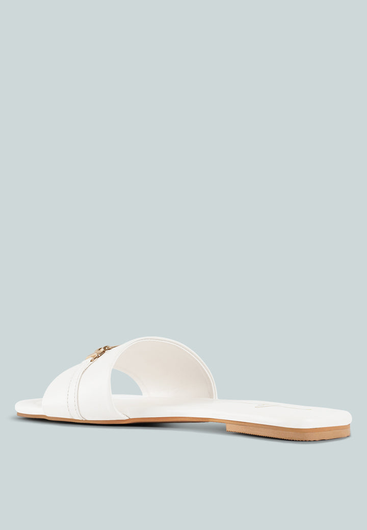 women metallic buckle embellished slip ons#color_off-white