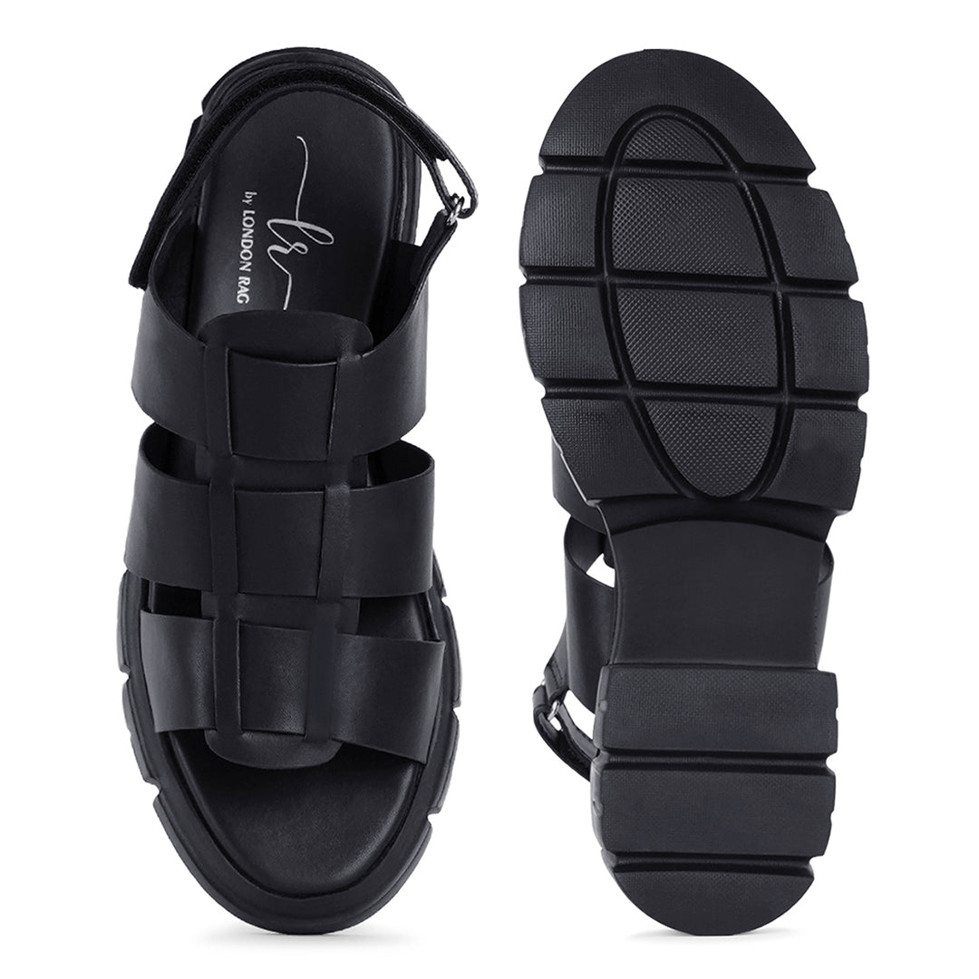 women faux leather strappy sandals#color_black