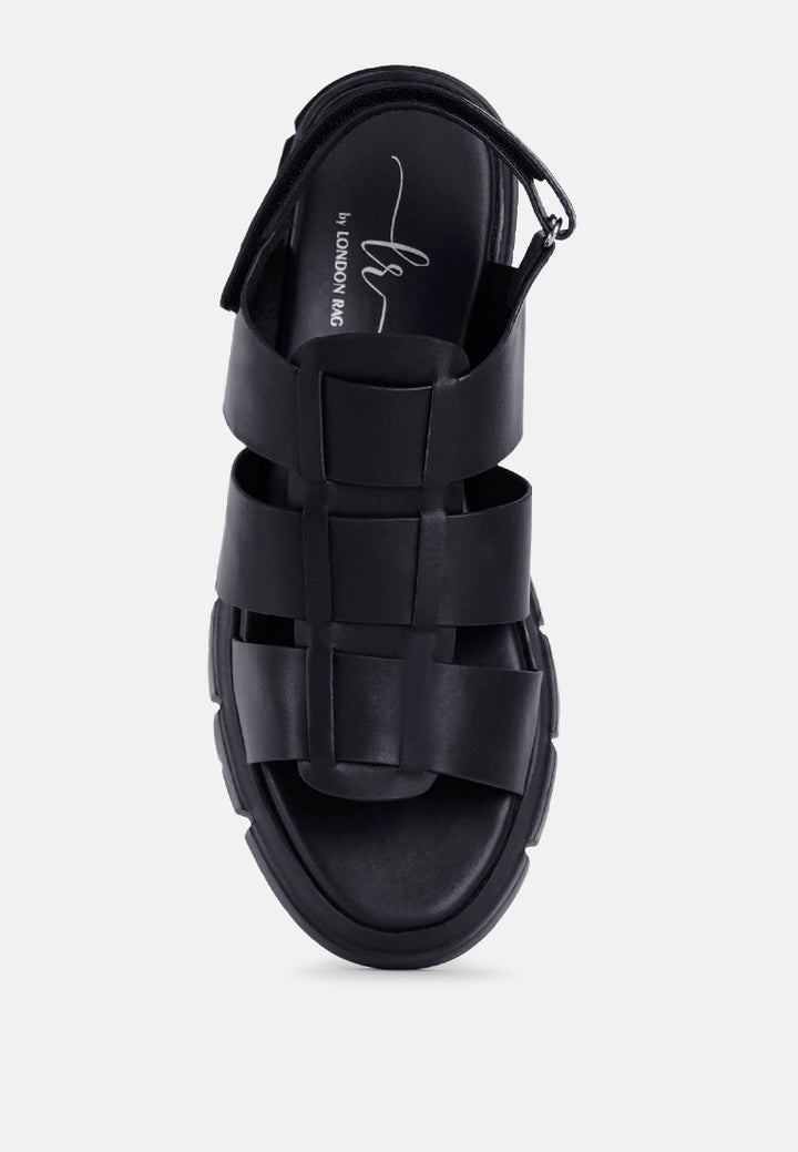 women faux leather strappy sandals#color_black