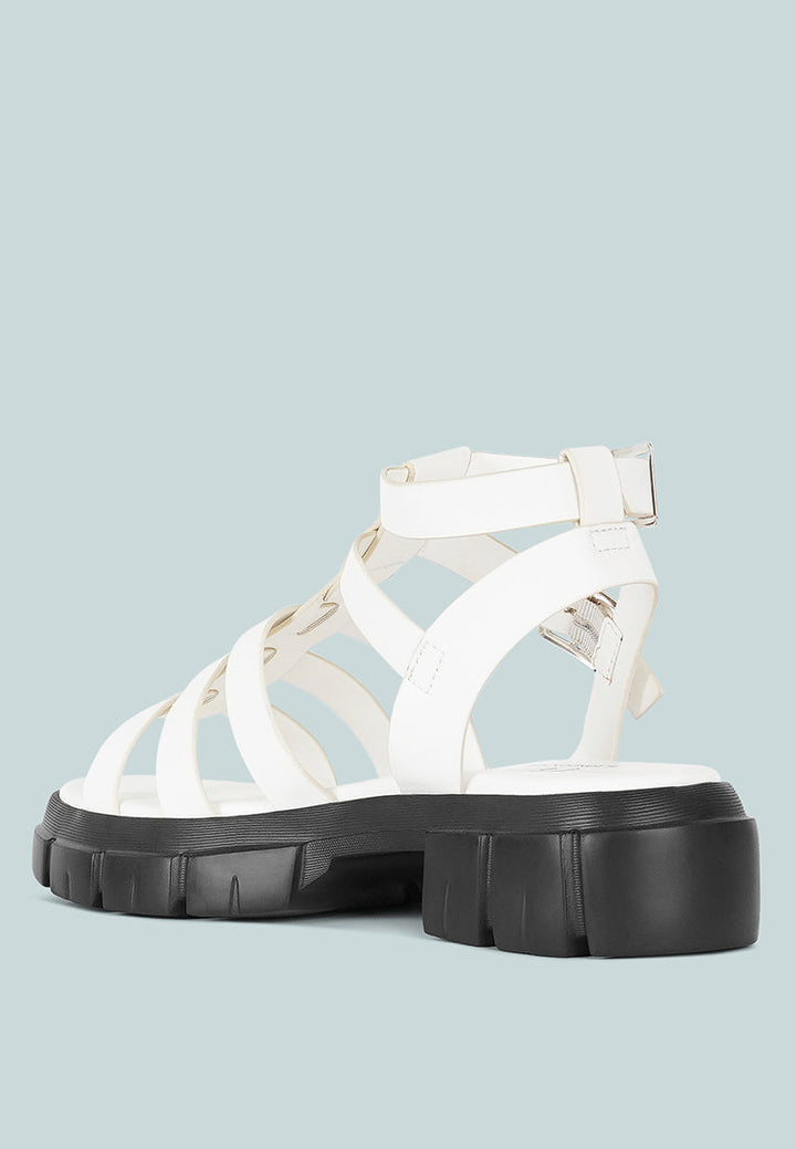 women faux leather gladiator sandals#color_white