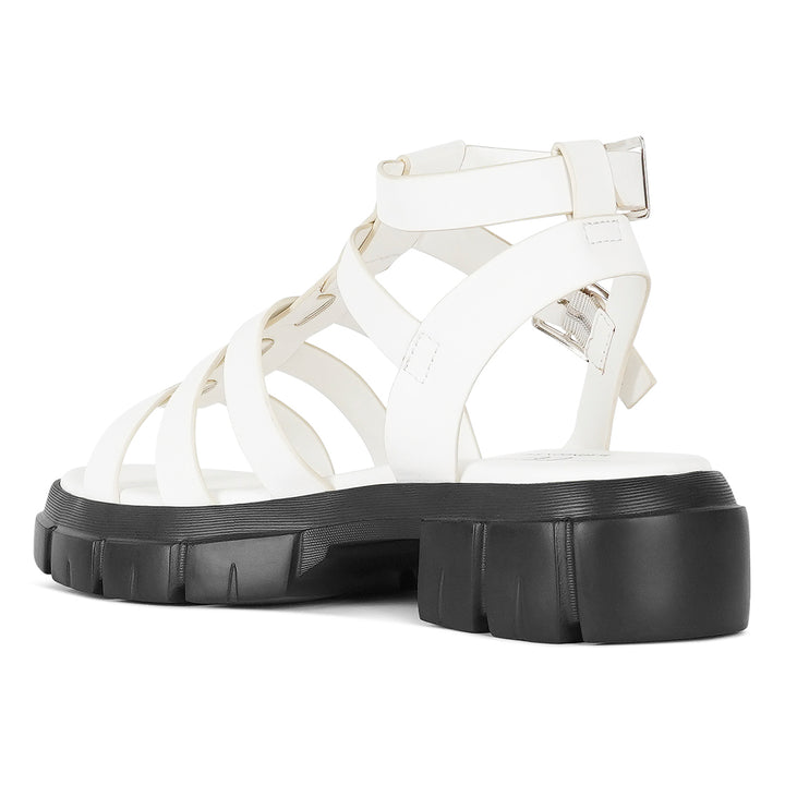 women faux leather gladiator sandals#color_white