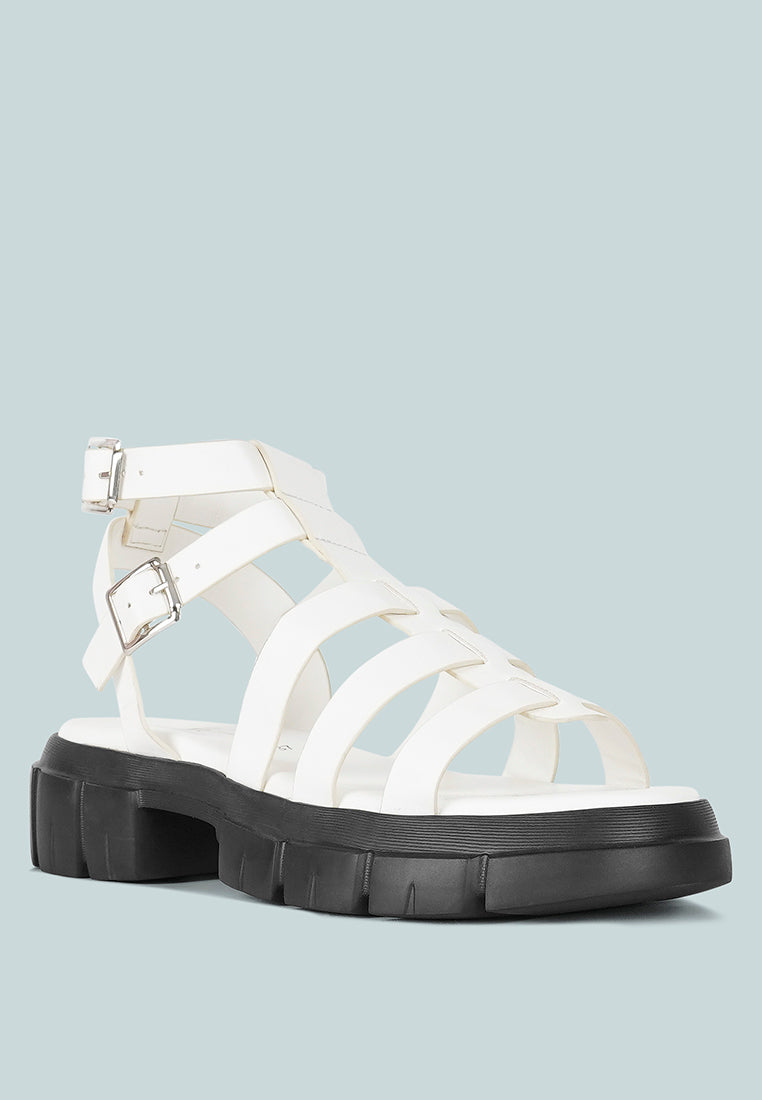 women faux leather gladiator sandals#color_white