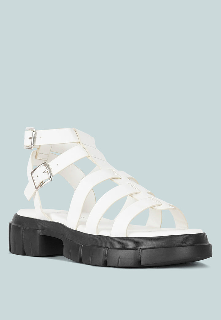 women faux leather gladiator sandals#color_white