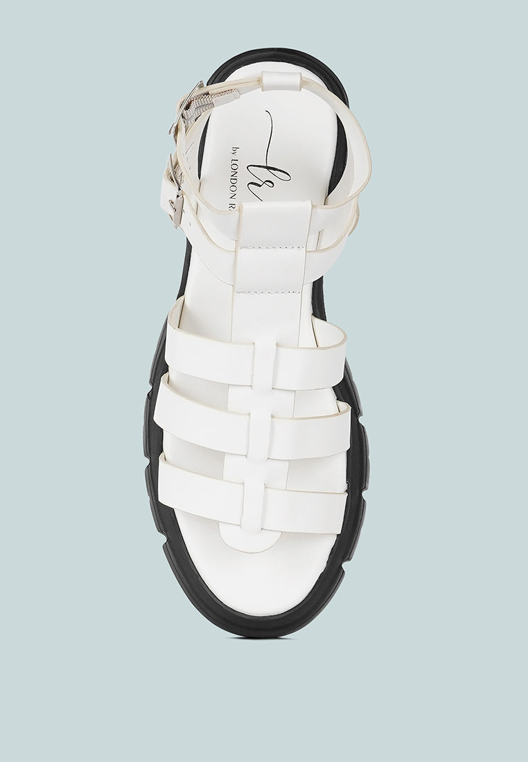 women faux leather gladiator sandals#color_white