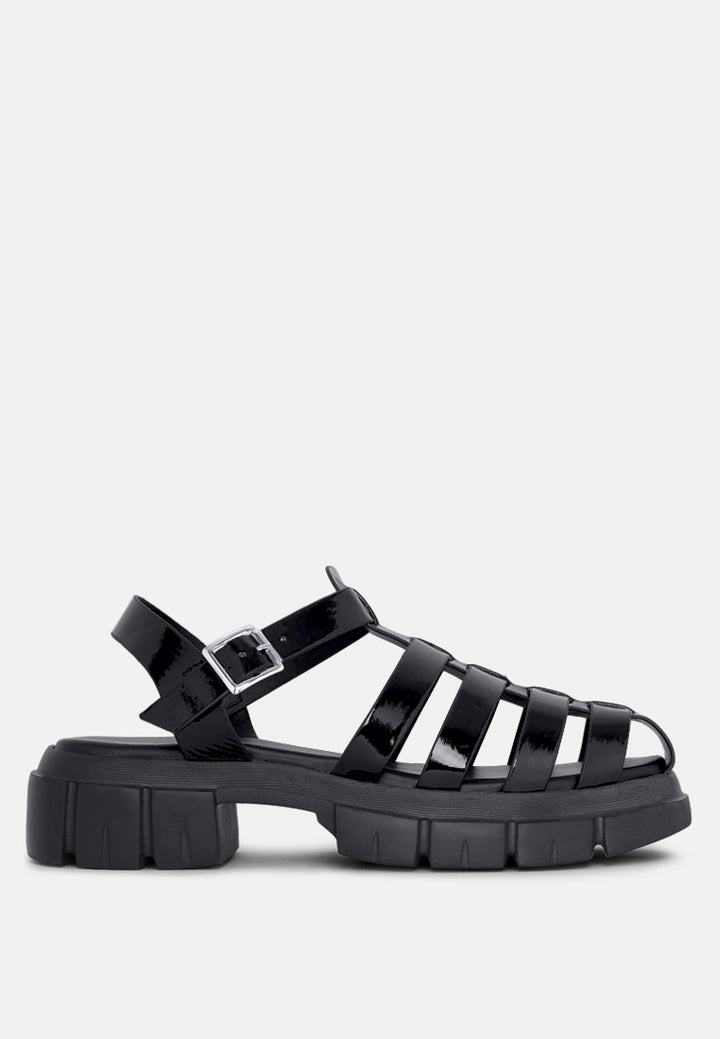 women round toe strappy flatforms#color_black