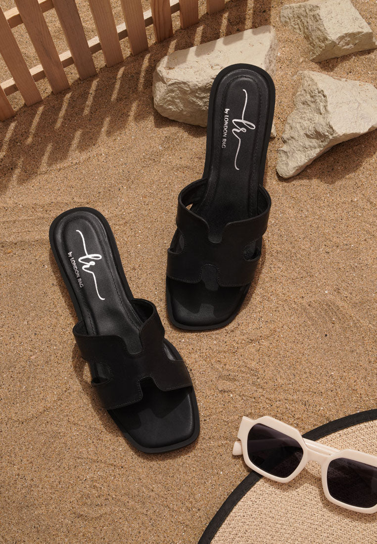 women faux leather wooden heel mules#color_black