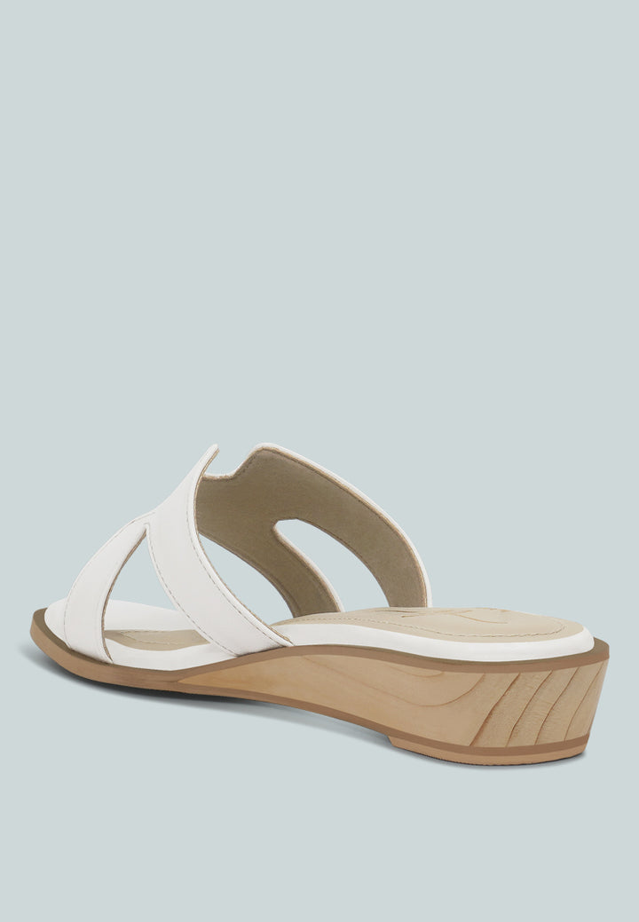 women faux leather wooden heel mules#color_white