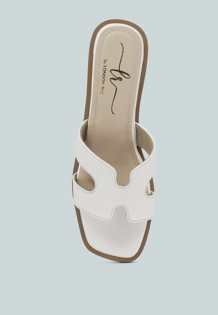 women faux leather wooden heel mules#color_white