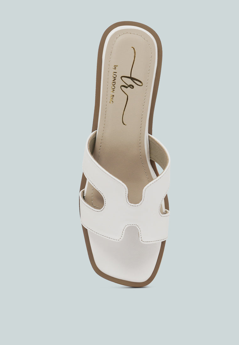 women faux leather wooden heel mules#color_white