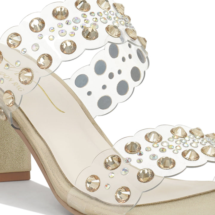 women metallic clear strap block heels#color_gold