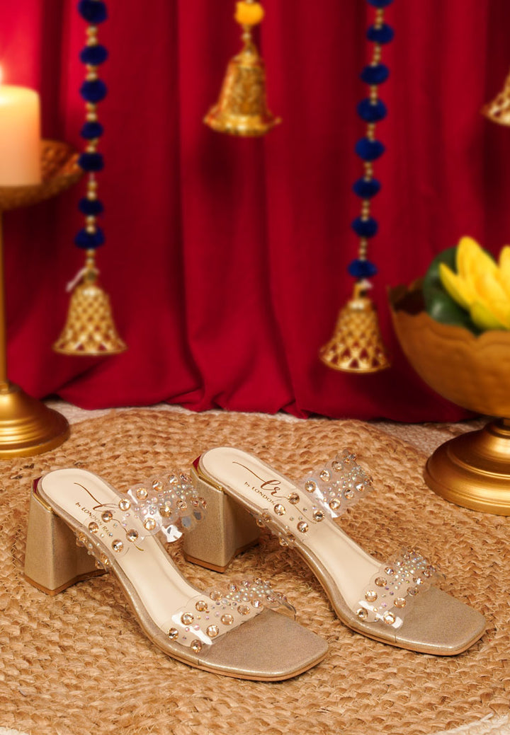 women metallic clear strap block heels#color_gold