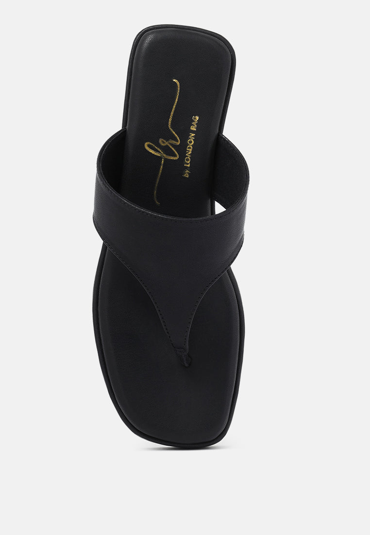 women faux leather thong toe sandals#color_black