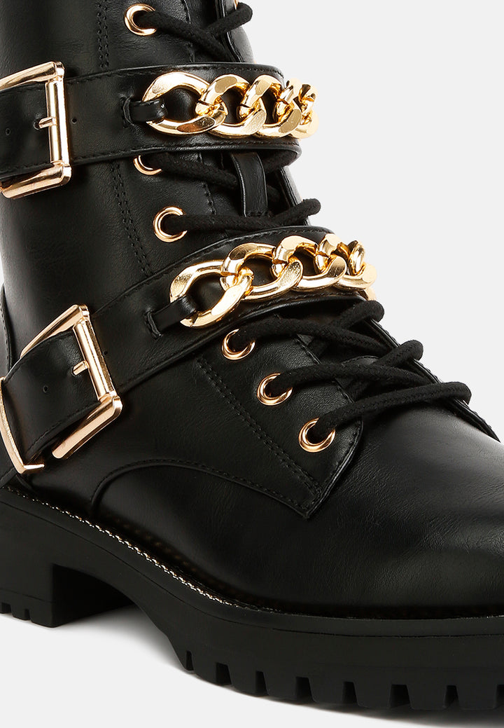 women metal chain detail biker boots#color_black