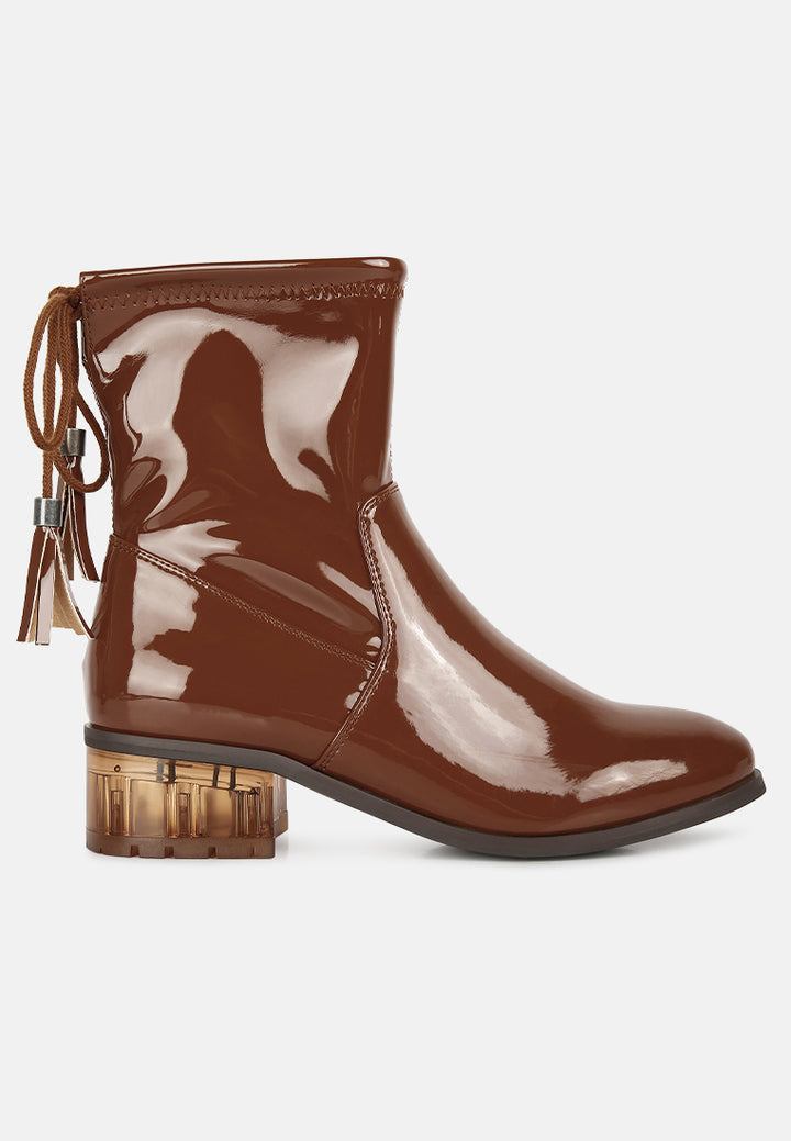 women cheer leader tassels detail ankle boots#color_tan