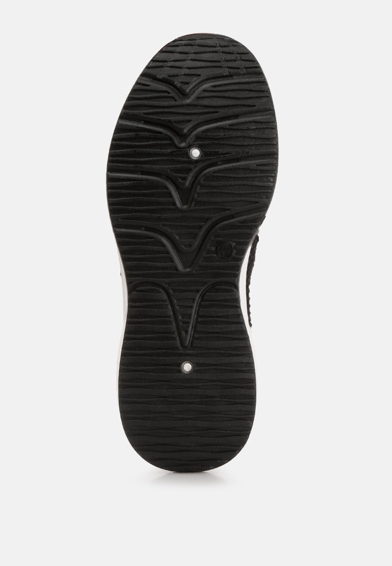 women elizha stud embellished sneakers#color_black