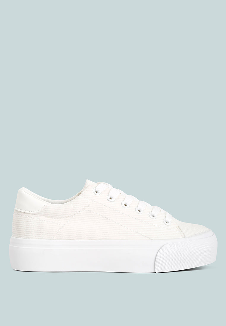 women hyra solid flatform canvas sneakers#color_white