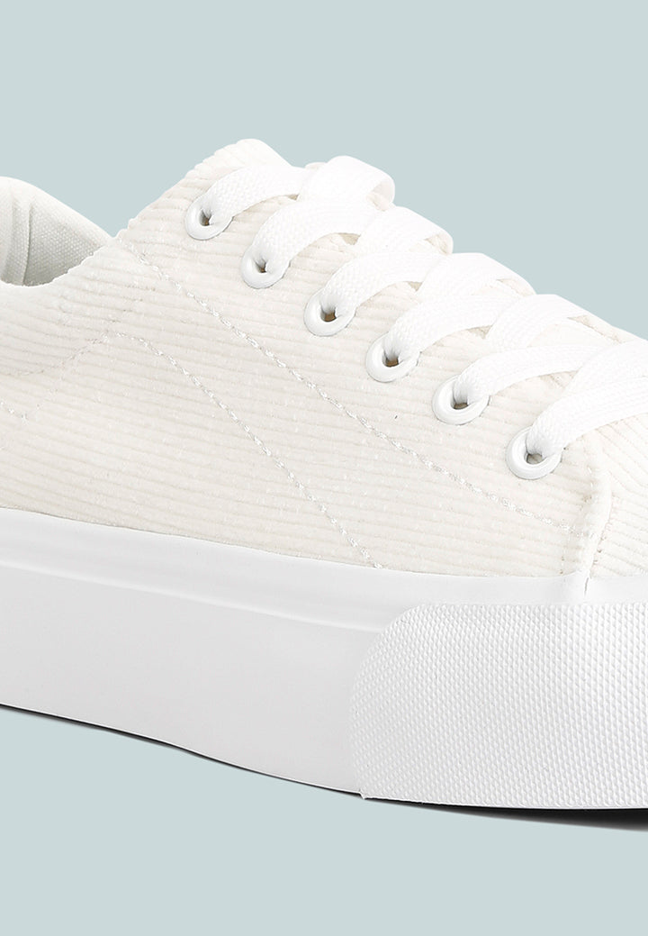 women hyra solid flatform canvas sneakers#color_white
