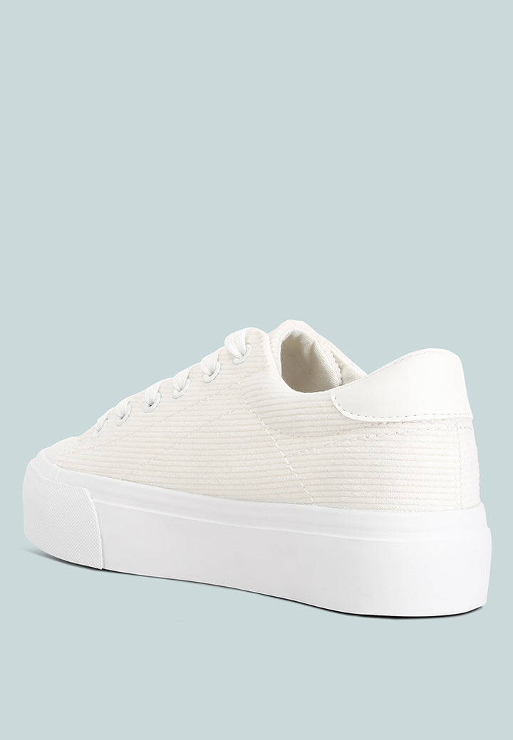 women hyra solid flatform canvas sneakers#color_white