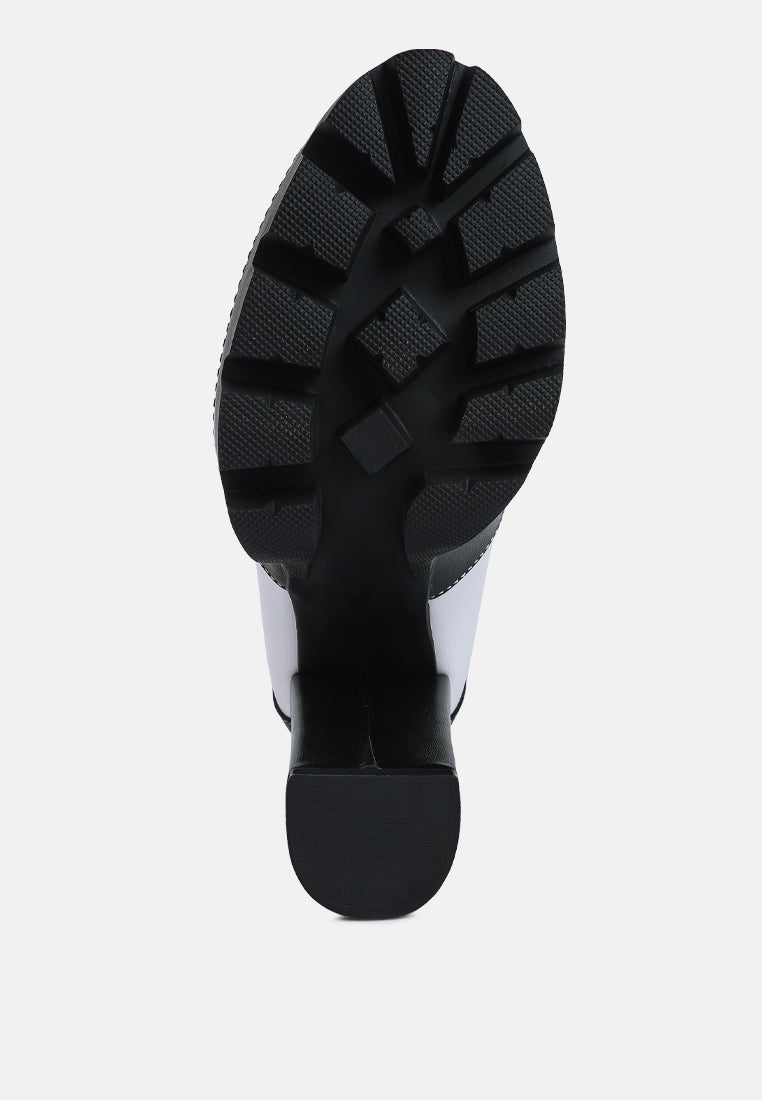 moos cow printed lace up block heel boots#color_black