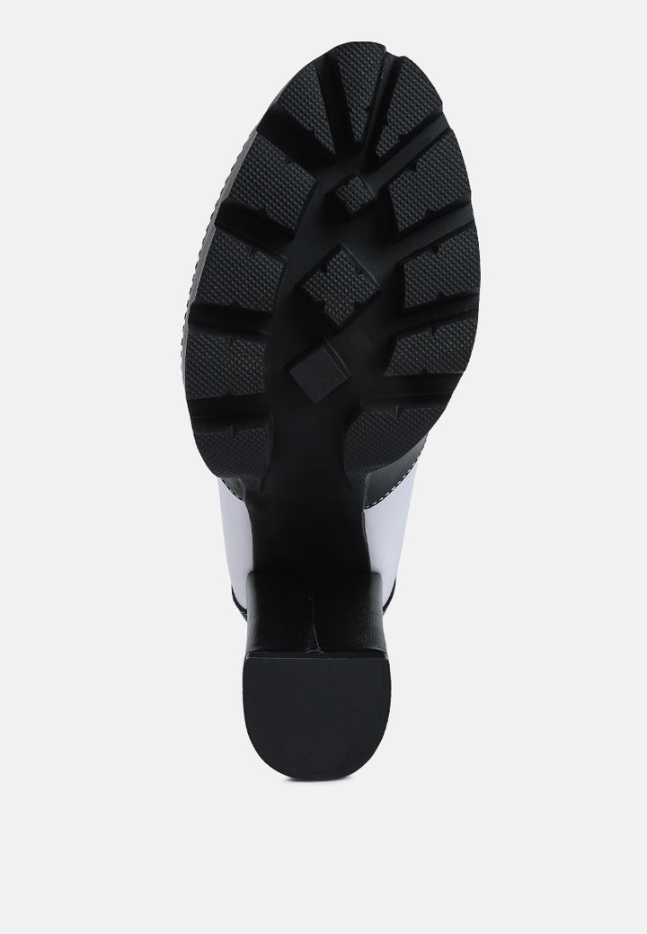 moos cow printed lace up block heel boots#color_black