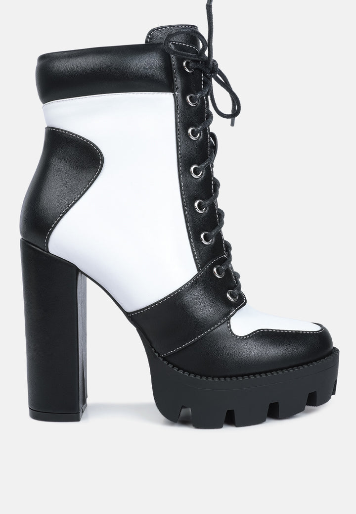 moos cow printed lace up block heel boots#color_black