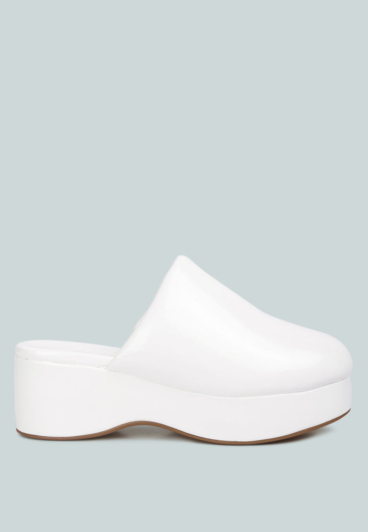 women olori solid platform slip on mules#color_white