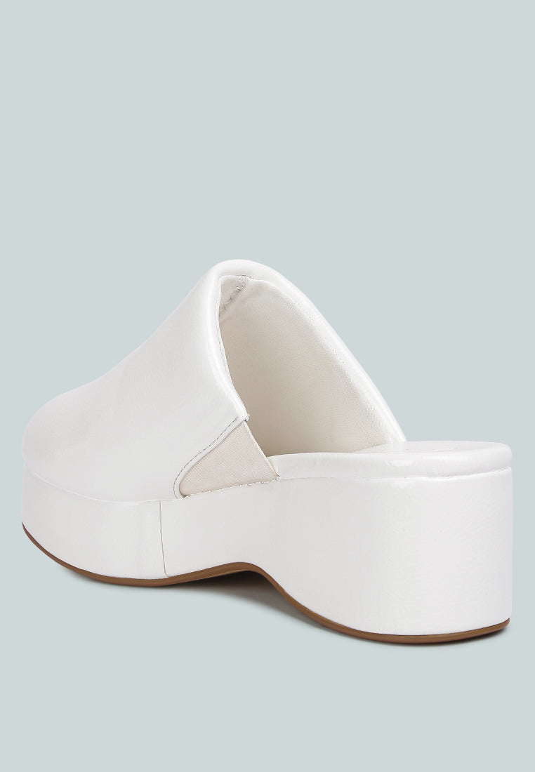 women olori solid platform slip on mules#color_white