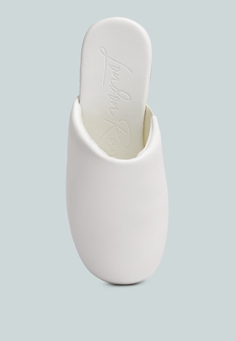 women olori solid platform slip on mules#color_white