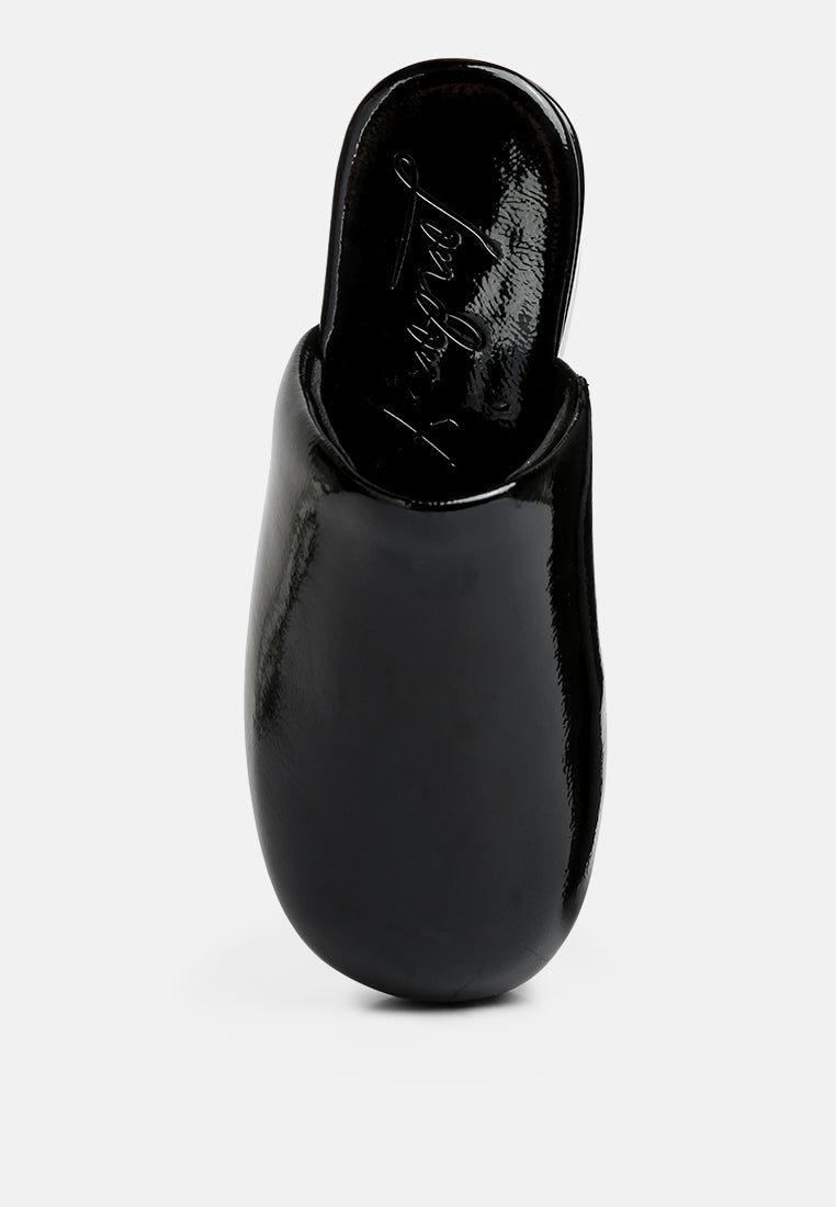 women olori solid platform slip on mules#color_black