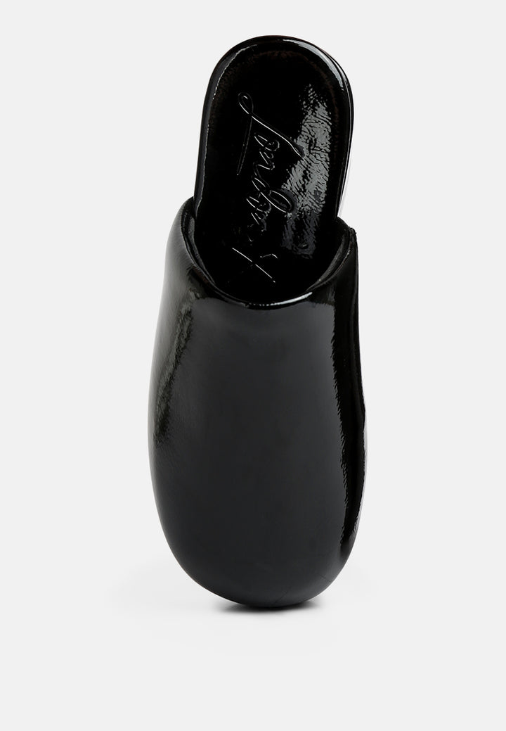 women olori solid platform slip on mules#color_black